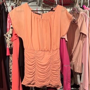 Roush top fits like a medium- super cute